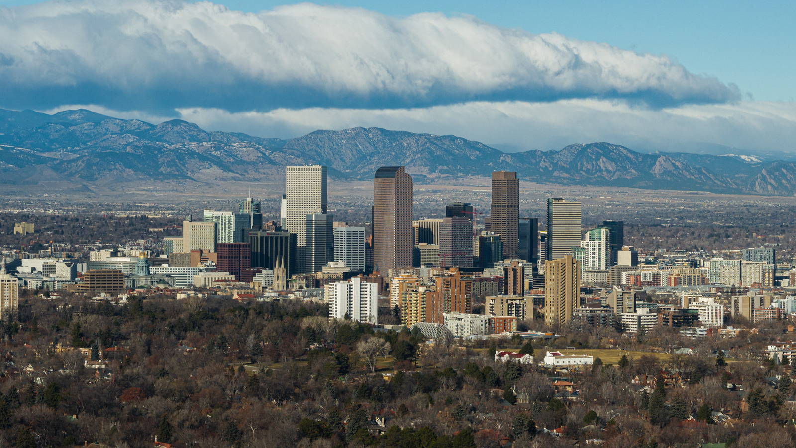 Denver, Colorado skyline with the Rocky Mountains behind